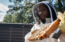 Georgia Tech's Janelle Dunlap conducts a hive inspection at the The Kendeda Building for Innovative Sustainable Design. Georgia Tech's Janelle Dunlap conducts a hive inspection at the The Kendeda Building for Innovative Sustainable Design.